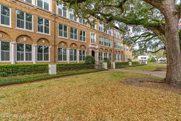 front view of a building with a yard