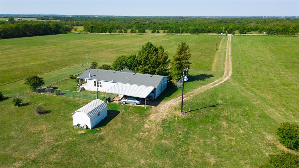5484 North Fm 1743 Windom, TX 75492 - Photo 27 of 34 a view of a lake with a yard