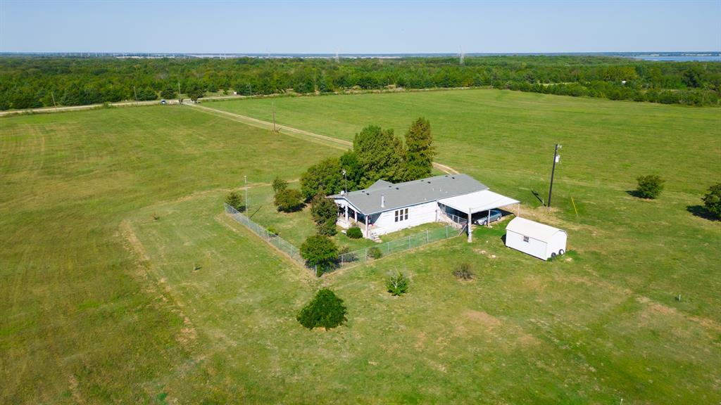 5484 North Fm 1743 Windom, TX 75492 - Photo 30 of 34 a view of a lake with a yard