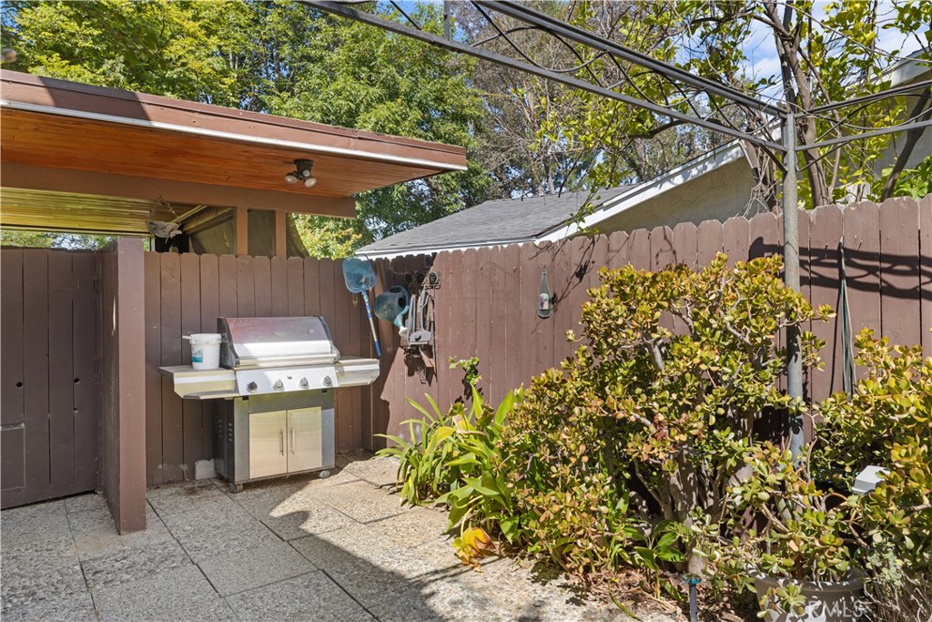 26096 Adamor Road Calabasas, CA 91302 - Photo 56 of 61 Side yard covered BBQ area with flood light.