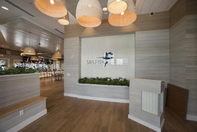 a view of living room and kitchen