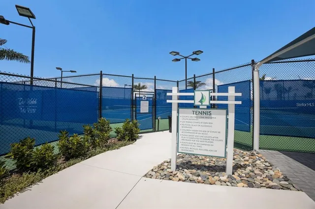 a view of a pathway with a park