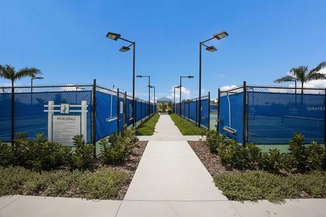 a view of a swimming pool with a patio