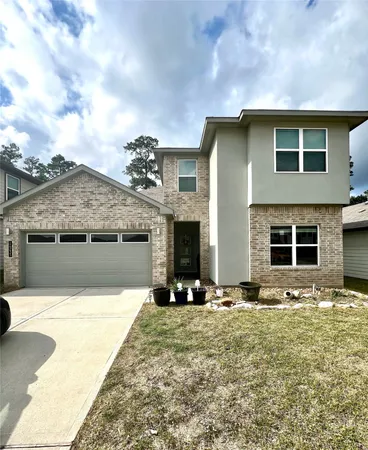 a front view of house with yard