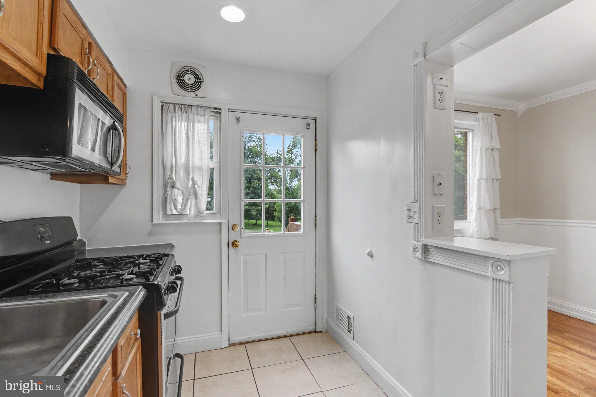 8218 Kavanagh Road Dundalk, MD 21222 - Photo 16 of 39 Bright and inviting kitchen entryway.