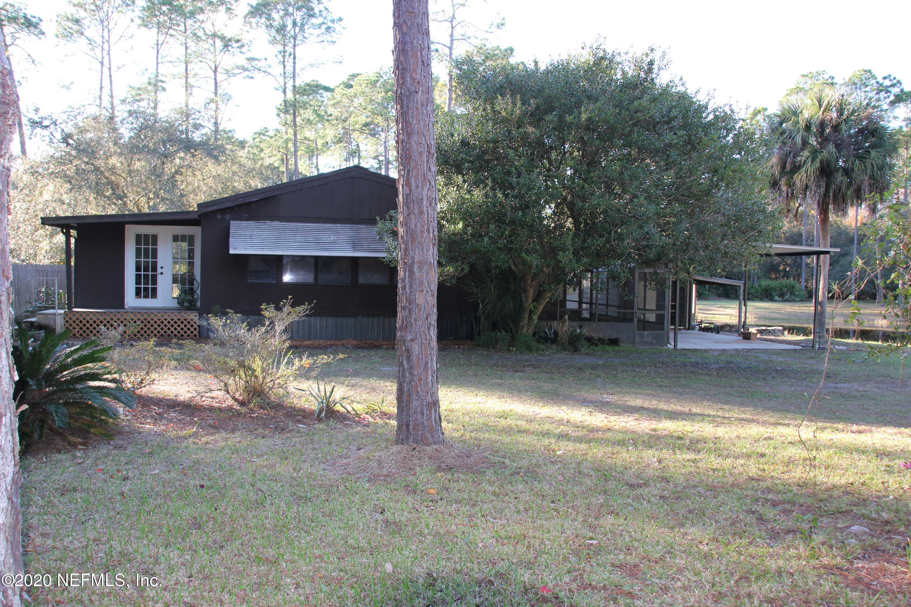 139 Whispering Pines Road Georgetown, FL 32139 - Photo 1 of 42 House, Carport, Screened Room, Pond