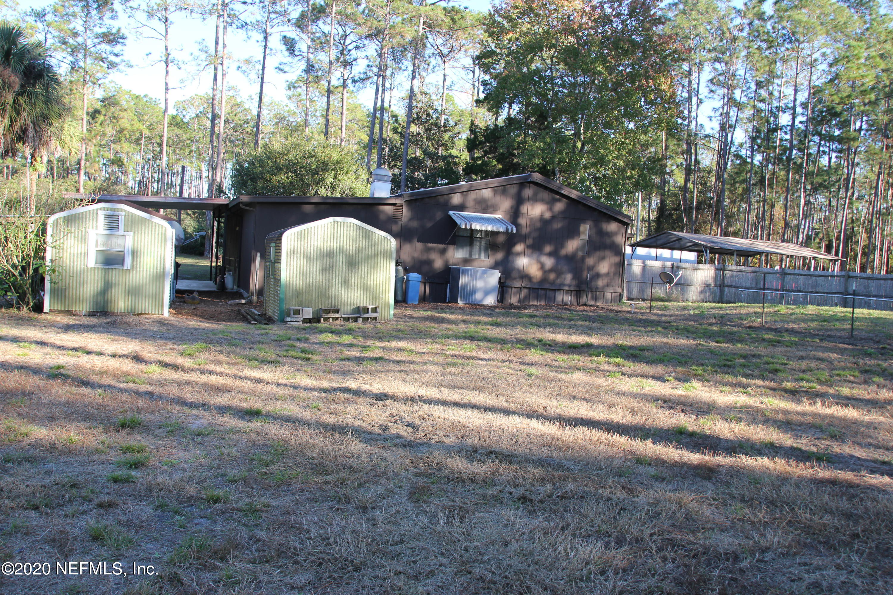139 Whispering Pines Road Georgetown, FL 32139 - Photo 38 of 42 Greenhouses and fenced pet yard or garde