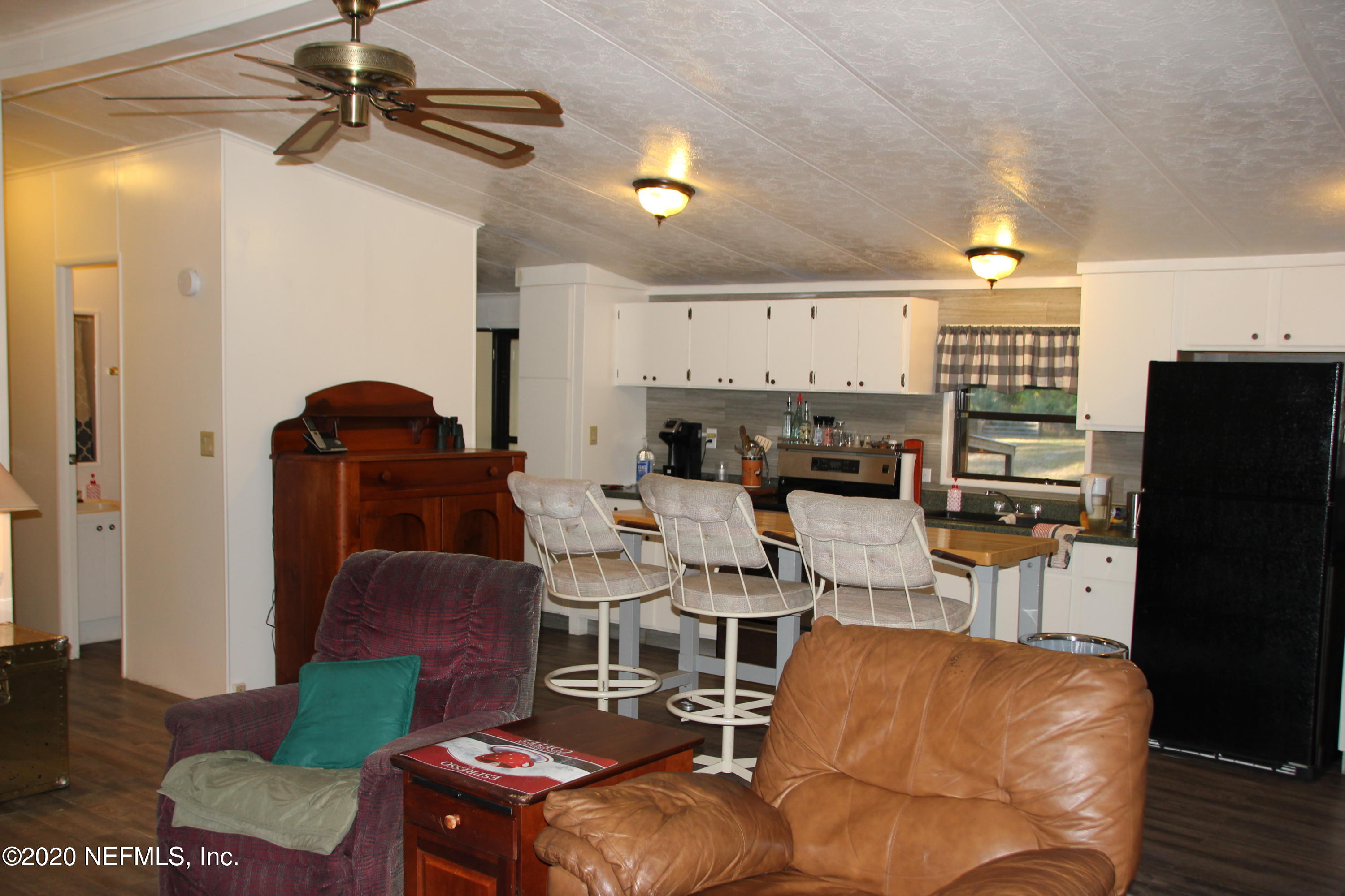 139 Whispering Pines Road Georgetown, FL 32139 - Photo 10 of 42 Great Room Kitchen Combo