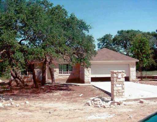 4 Rhapsody Lane Wimberley, TX 78676 - Photo 1 of 1 a view of a house with a tree