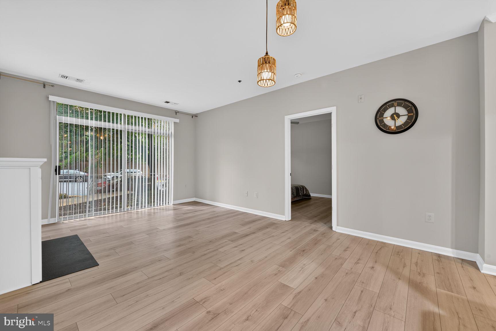 11775 Stratford House Place, Unit 112 Reston, VA 20190 - Photo 14 of 53 Living Room & Dining Area