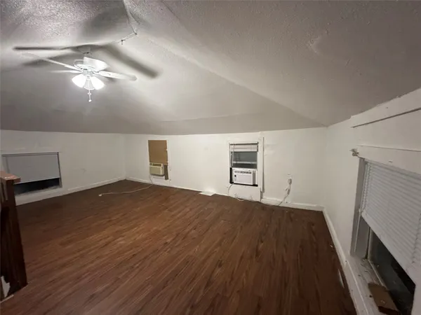 a view of livingroom with furniture and wooden floor