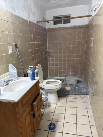 a bathroom with a sink and a shower