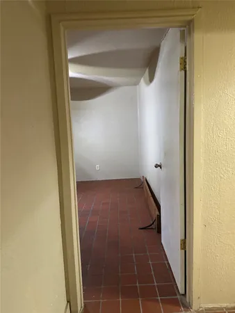 a kitchen with stainless steel appliances granite countertop a refrigerator and a stove