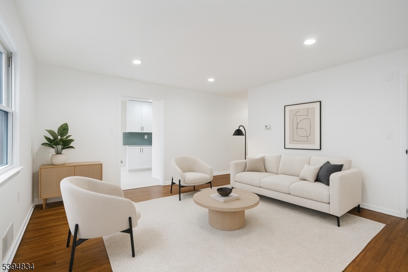 76 Mt Kemble Avenue, Unit 1 Morristown, NJ 07960 - Photo 5 of 20 a living room with furniture and a potted plant
