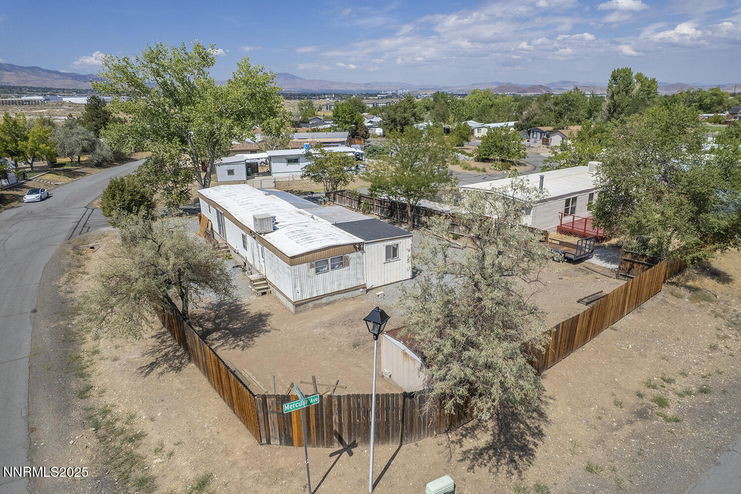 290 Pisces Circle Reno, NV 89521 - Photo 4 of 21 a view of a house with a yard