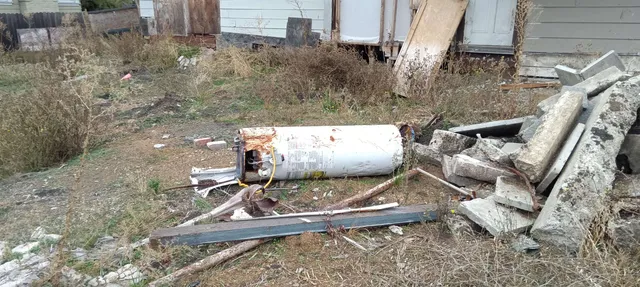 a view of a car parked in front of a house
