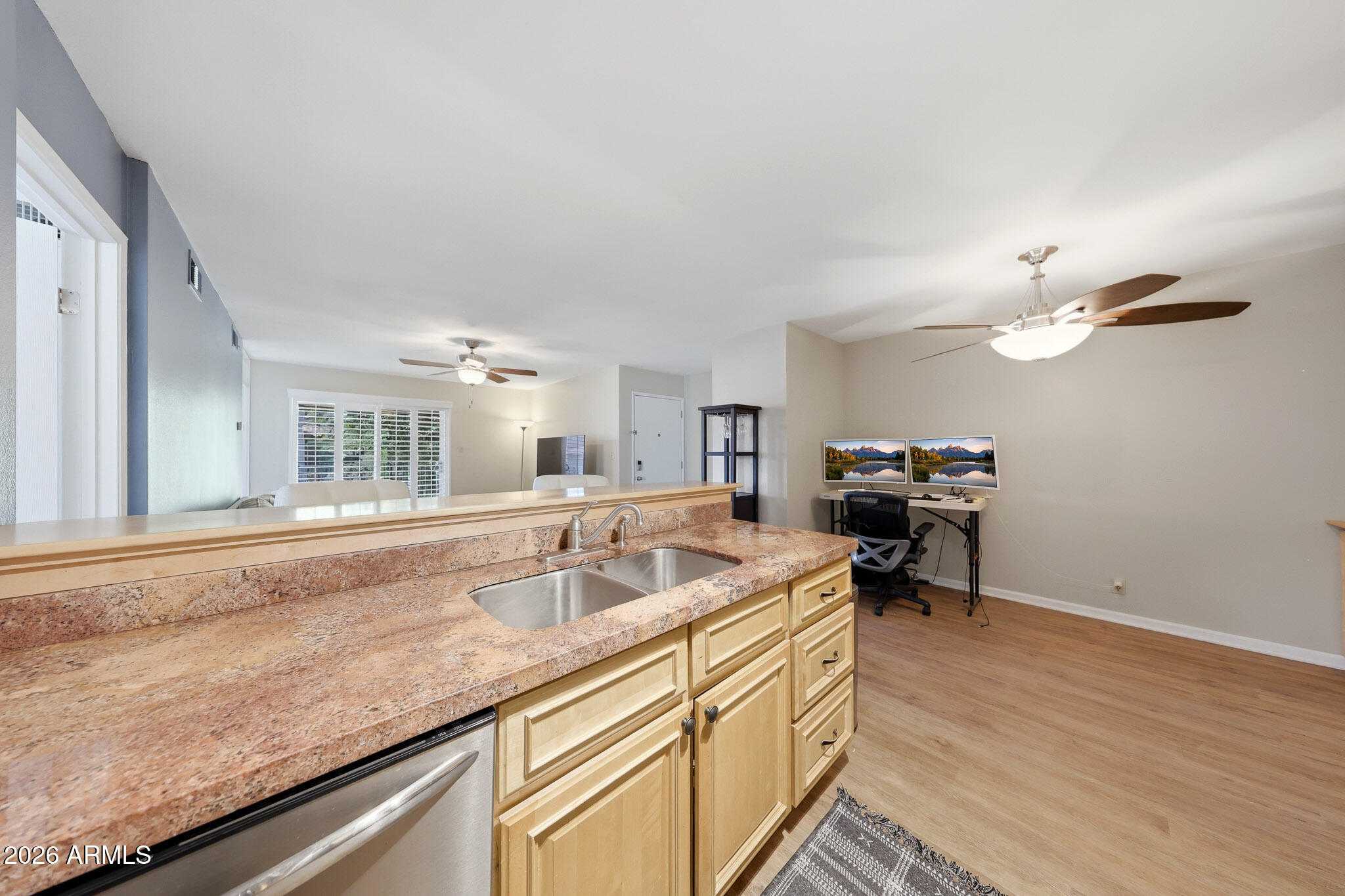 5525 East Thomas Road, Unit R 16 Phoenix, AZ 85018 - Photo 13 of 27 a kitchen with a sink cabinets and appliances