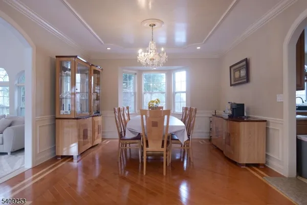 a view of a dining room with furniture and window
