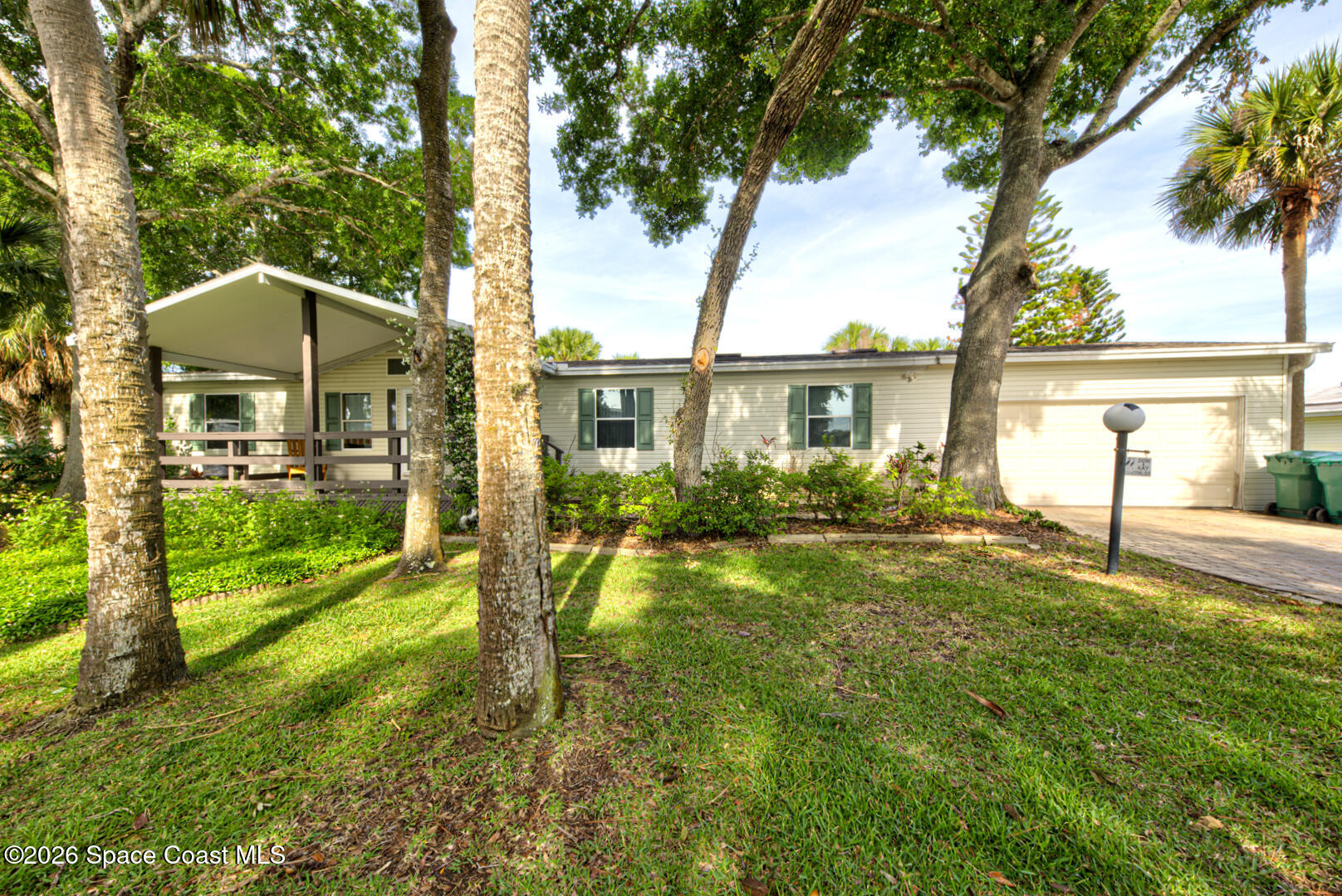 176 Woodsmill Boulevard, Unit 177 Cocoa, FL 32926 - Photo 2 of 63 3 front of house