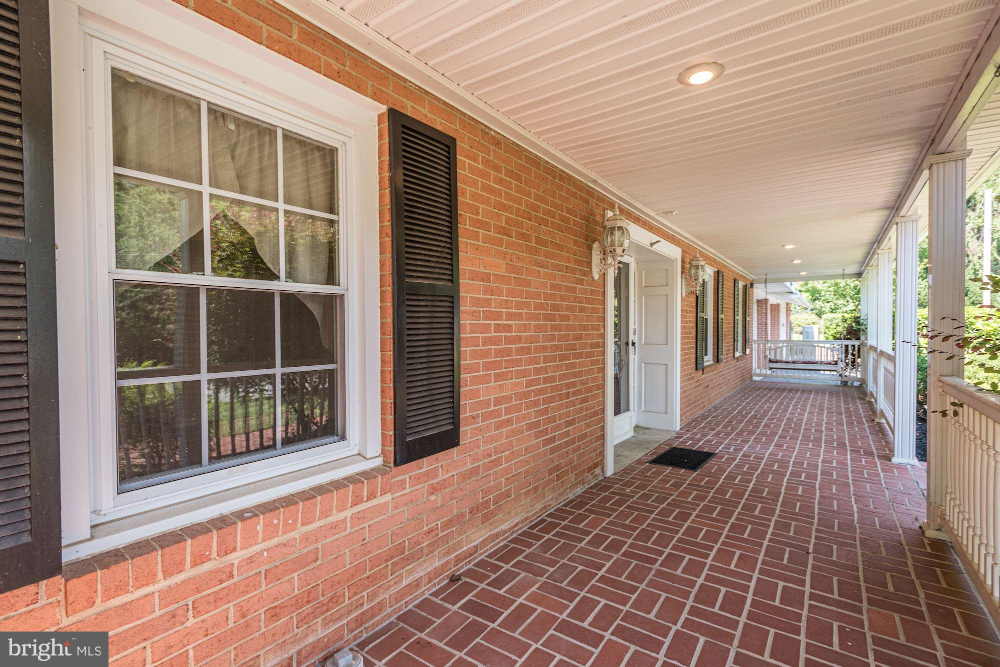 5601 Drought Spring Court Frederick, MD 21702 - Photo 38 of 43 Covered Front Porch
