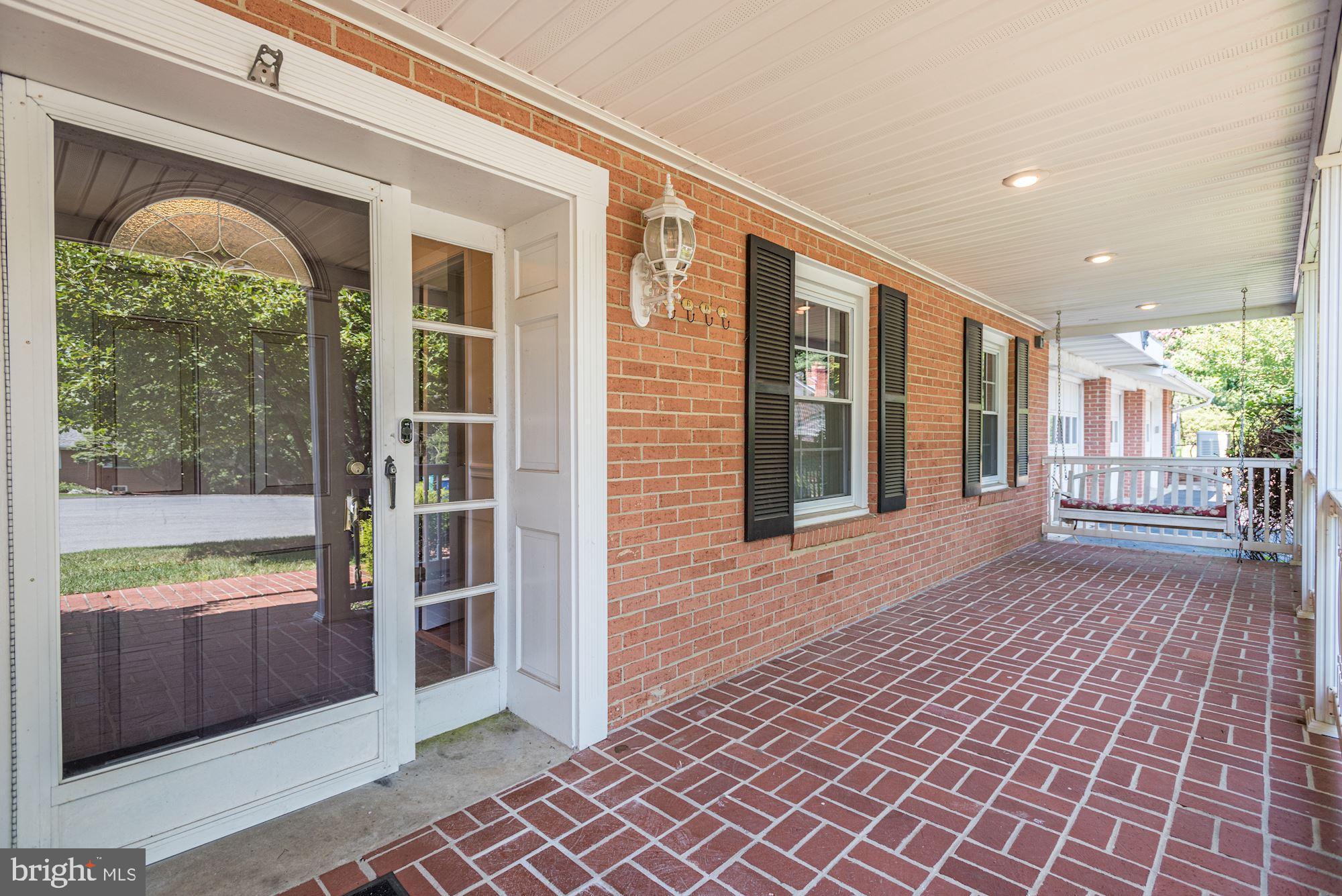 5601 Drought Spring Court Frederick, MD 21702 - Photo 39 of 43 Covered Front Porch