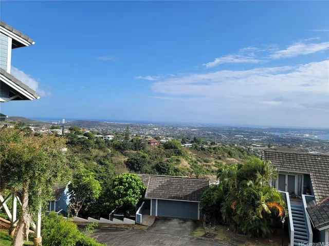 a view of a city with tall buildings