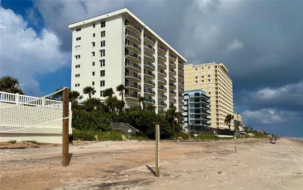 a view of street with cars parked