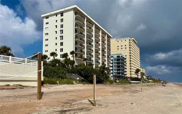 a view of street with cars parked