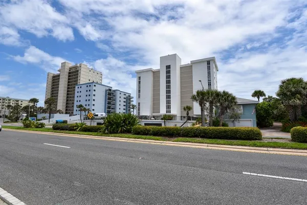 a view of a city with tall buildings