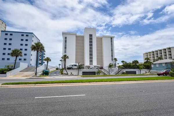 a view of outdoor space with swimming pool and furniture