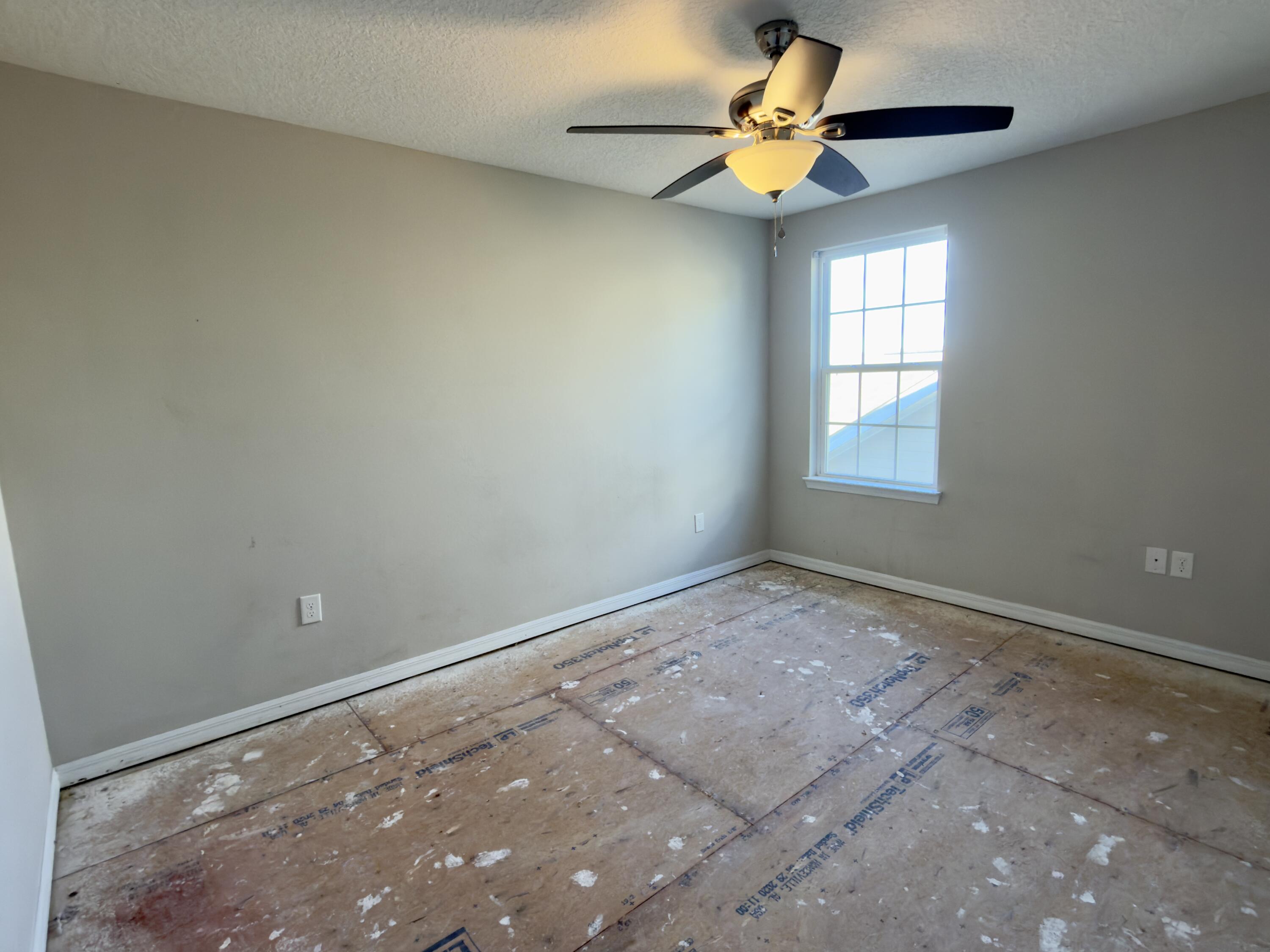 201 Wainwright Drive Crestview, FL 32539 - Photo 13 of 26 a view of an empty room with a window