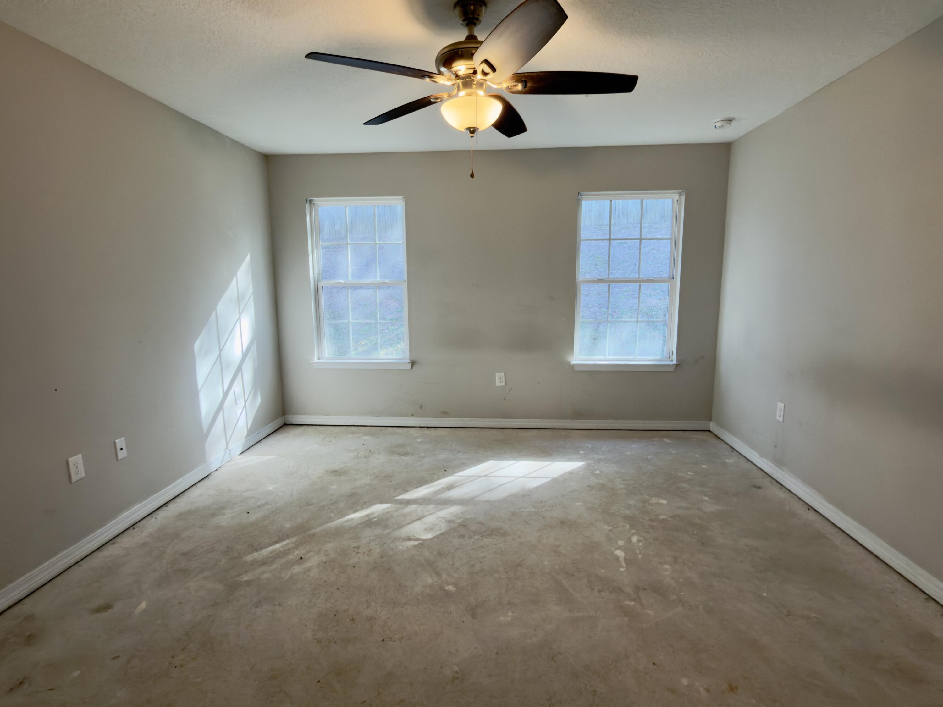 201 Wainwright Drive Crestview, FL 32539 - Photo 7 of 26 a view of an empty room with a window
