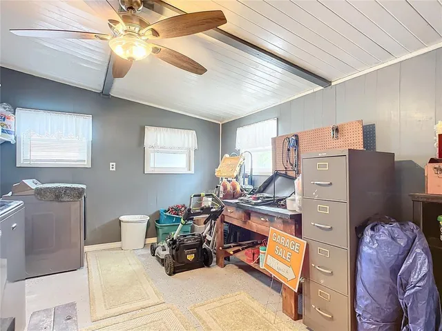 a view of a dining area with furniture and wooden floor