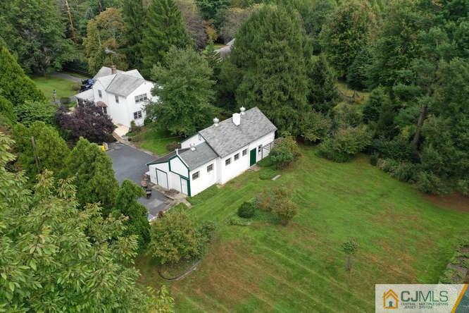 963 Ridge Road Princeton, NJ 08540 - Photo 14 of 25 an aerial view of a house with a yard
