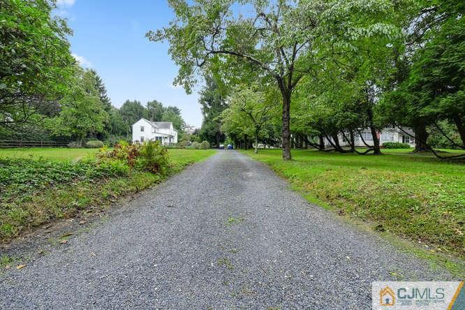 963 Ridge Road Princeton, NJ 08540 - Photo 19 of 25 a view of a park with large trees