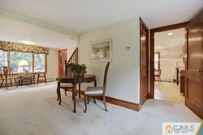 963 Ridge Road Princeton, NJ 08540 - Photo 10 of 25 a view of a livingroom with furniture and a large window