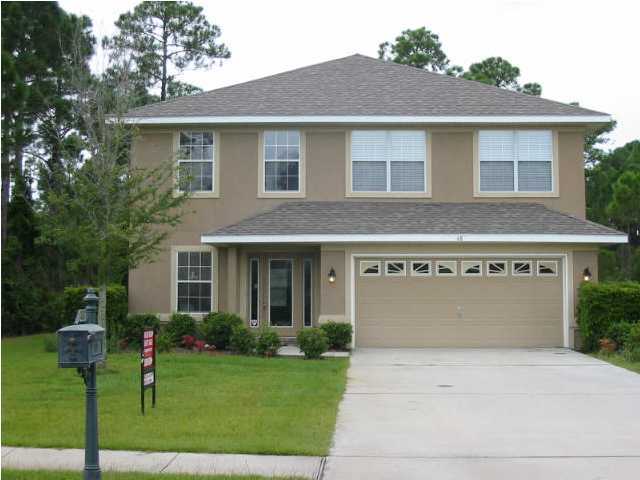 48 Red Maple Court Santa Rosa Beach, FL 32459 - Photo 1 of 5 a front view of house with yard and green space