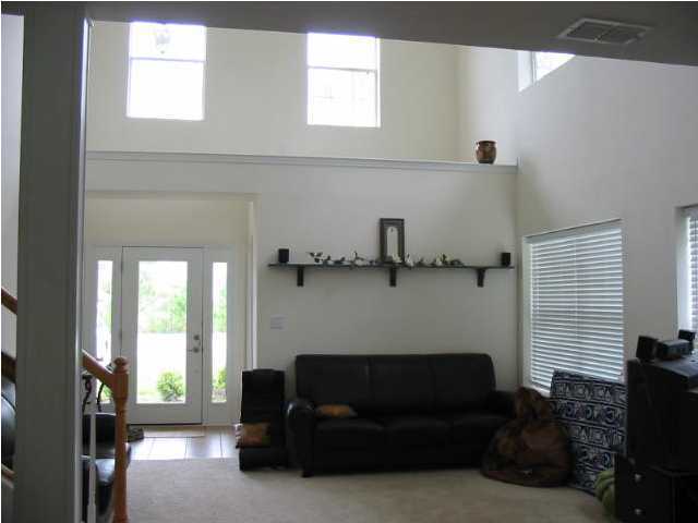 48 Red Maple Court Santa Rosa Beach, FL 32459 - Photo 2 of 5 a living room with furniture and a window
