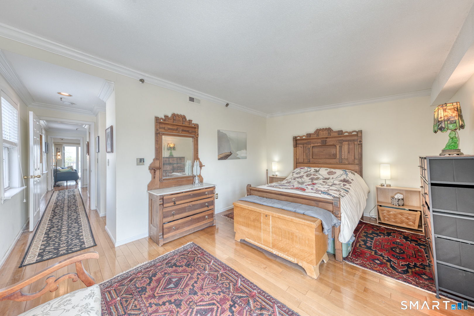 234 South Main Street, Unit 416 Middletown, CT 06457 - Photo 18 of 37 a bedroom with a bed and a rug