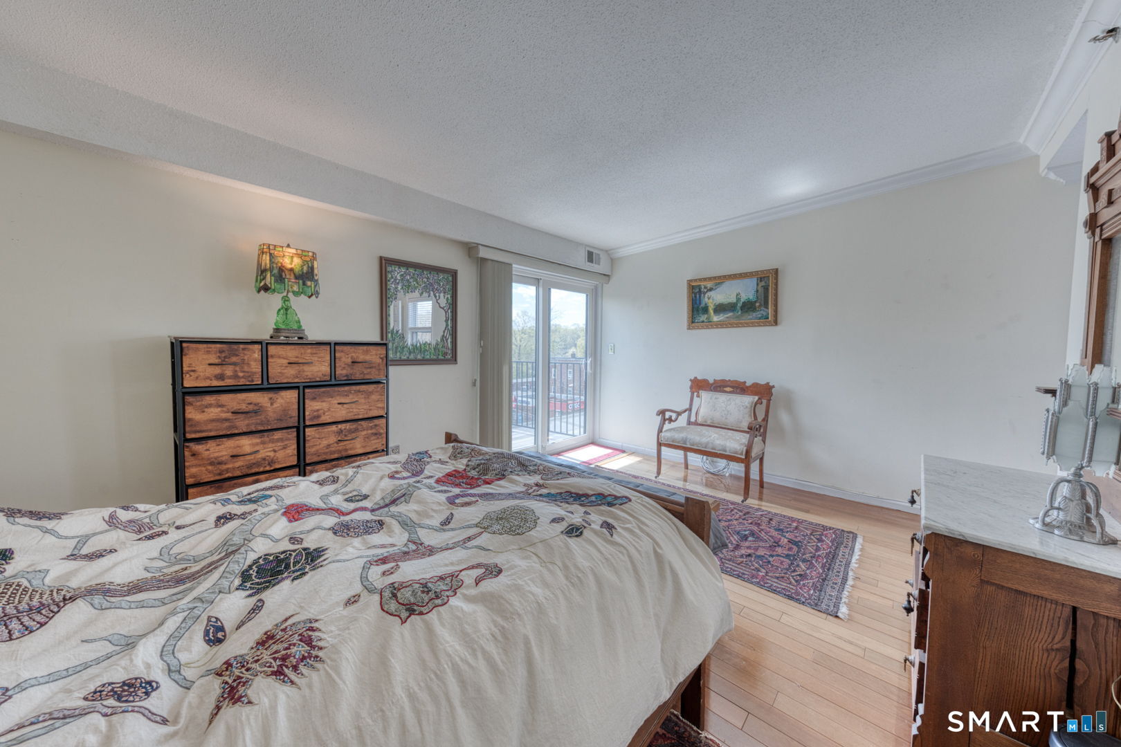 234 South Main Street, Unit 416 Middletown, CT 06457 - Photo 19 of 37 a bedroom with a bed and a dresser