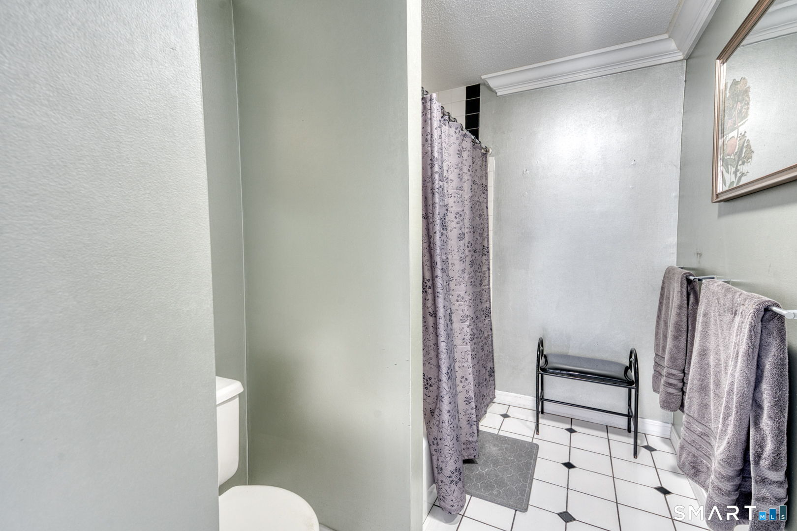 234 South Main Street, Unit 416 Middletown, CT 06457 - Photo 21 of 37 a bathroom with a granite countertop shower and a toilet