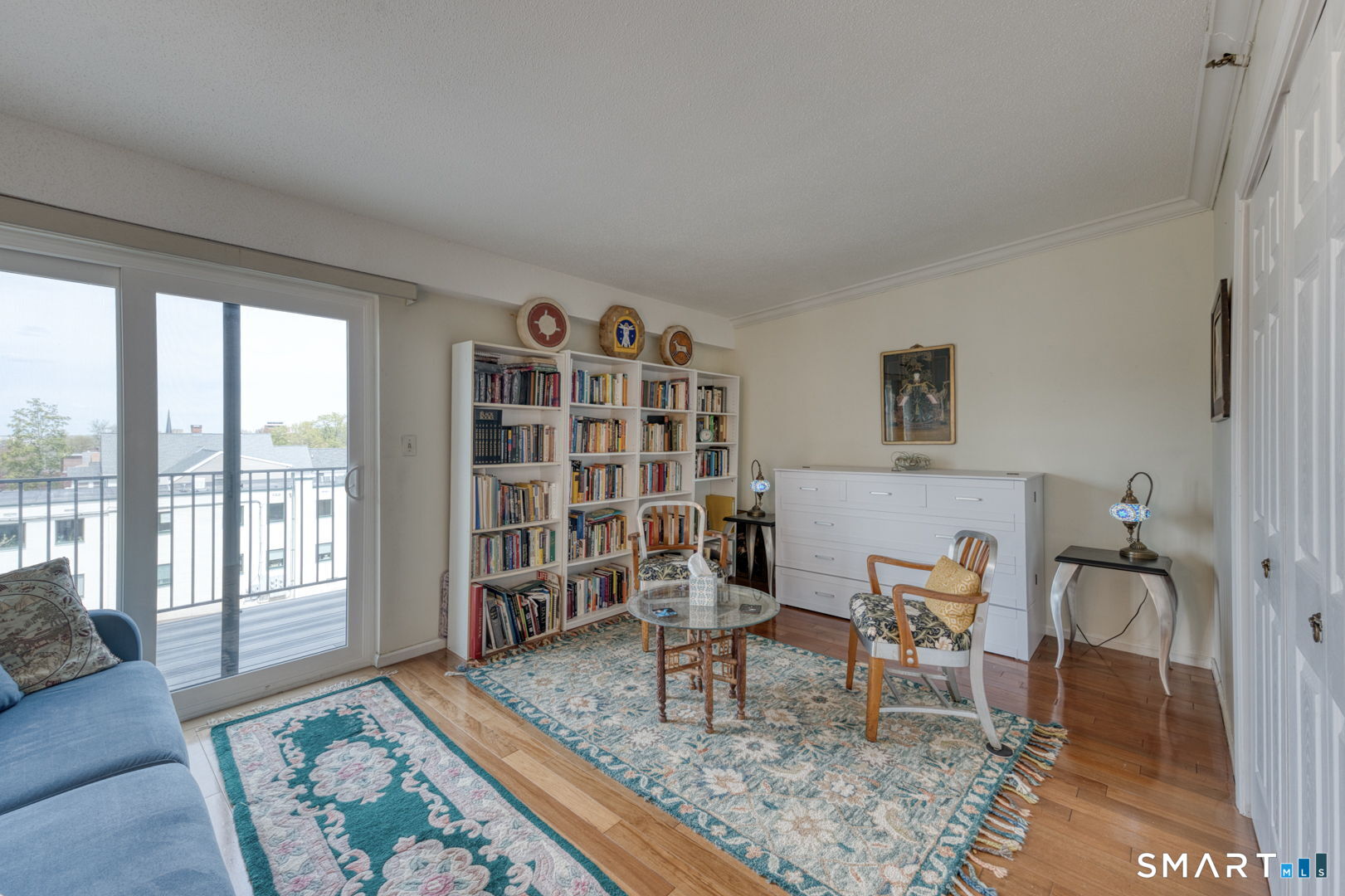 234 South Main Street, Unit 416 Middletown, CT 06457 - Photo 22 of 37 a living room with furniture and a rug