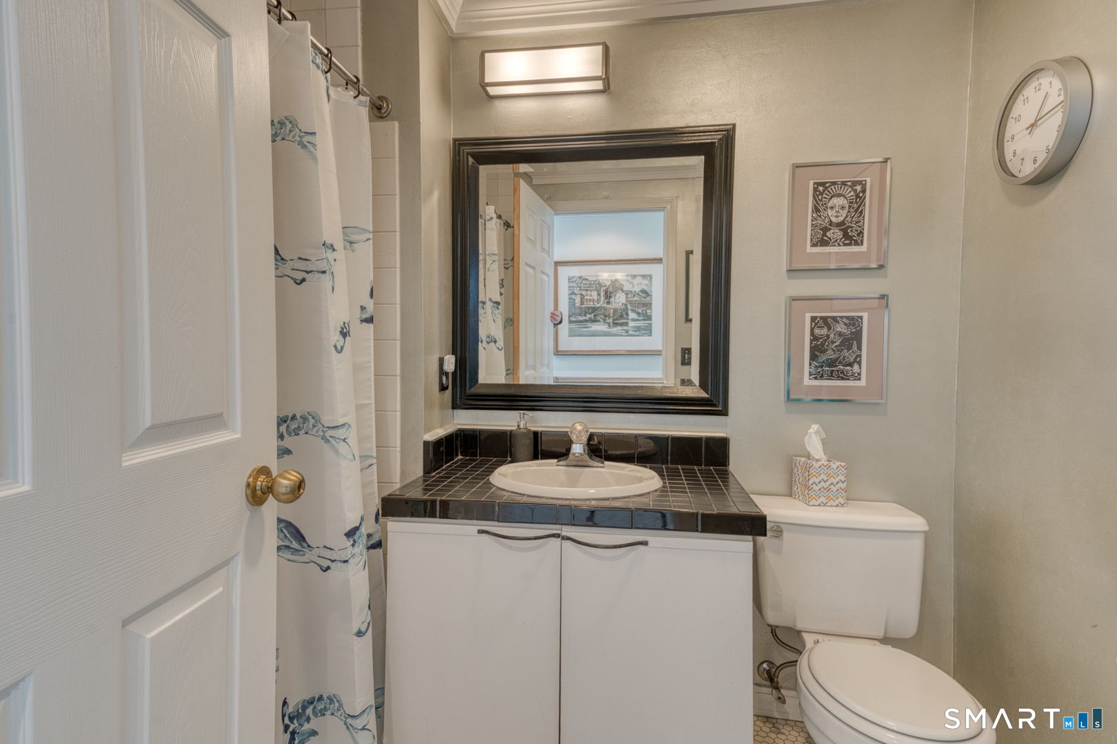 234 South Main Street, Unit 416 Middletown, CT 06457 - Photo 25 of 37 a bathroom with a granite countertop sink toilet and a mirror