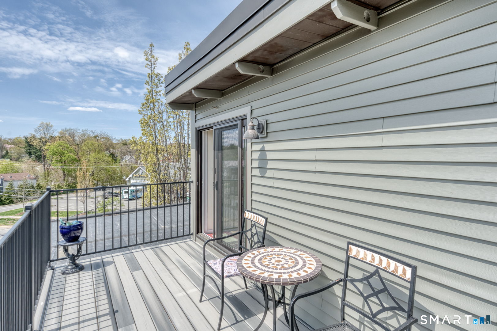 234 South Main Street, Unit 416 Middletown, CT 06457 - Photo 28 of 37 a view of a balcony with wooden floor