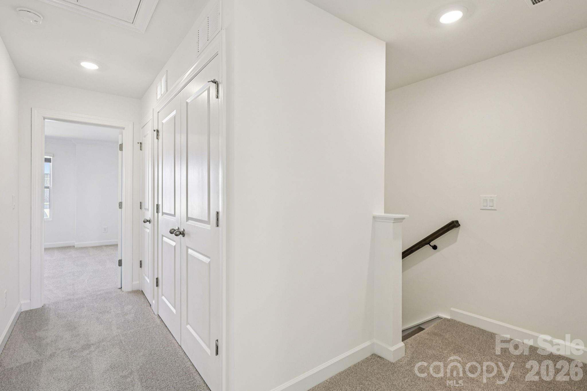335 Golden Maple Court Fort Mill, SC 29708 - Photo 15 of 26 a view of a hallway with closet