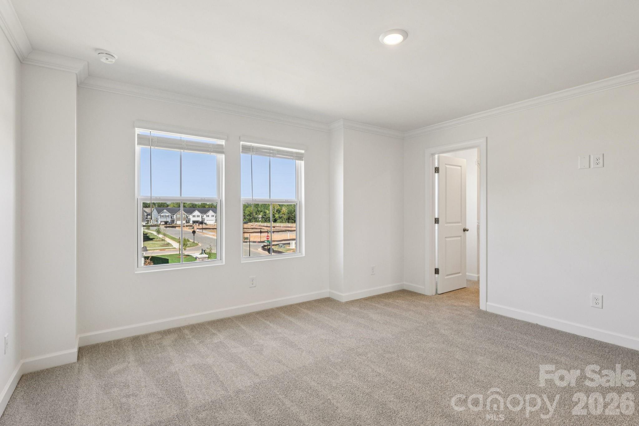 335 Golden Maple Court Fort Mill, SC 29708 - Photo 16 of 26 a view of an empty room with a window