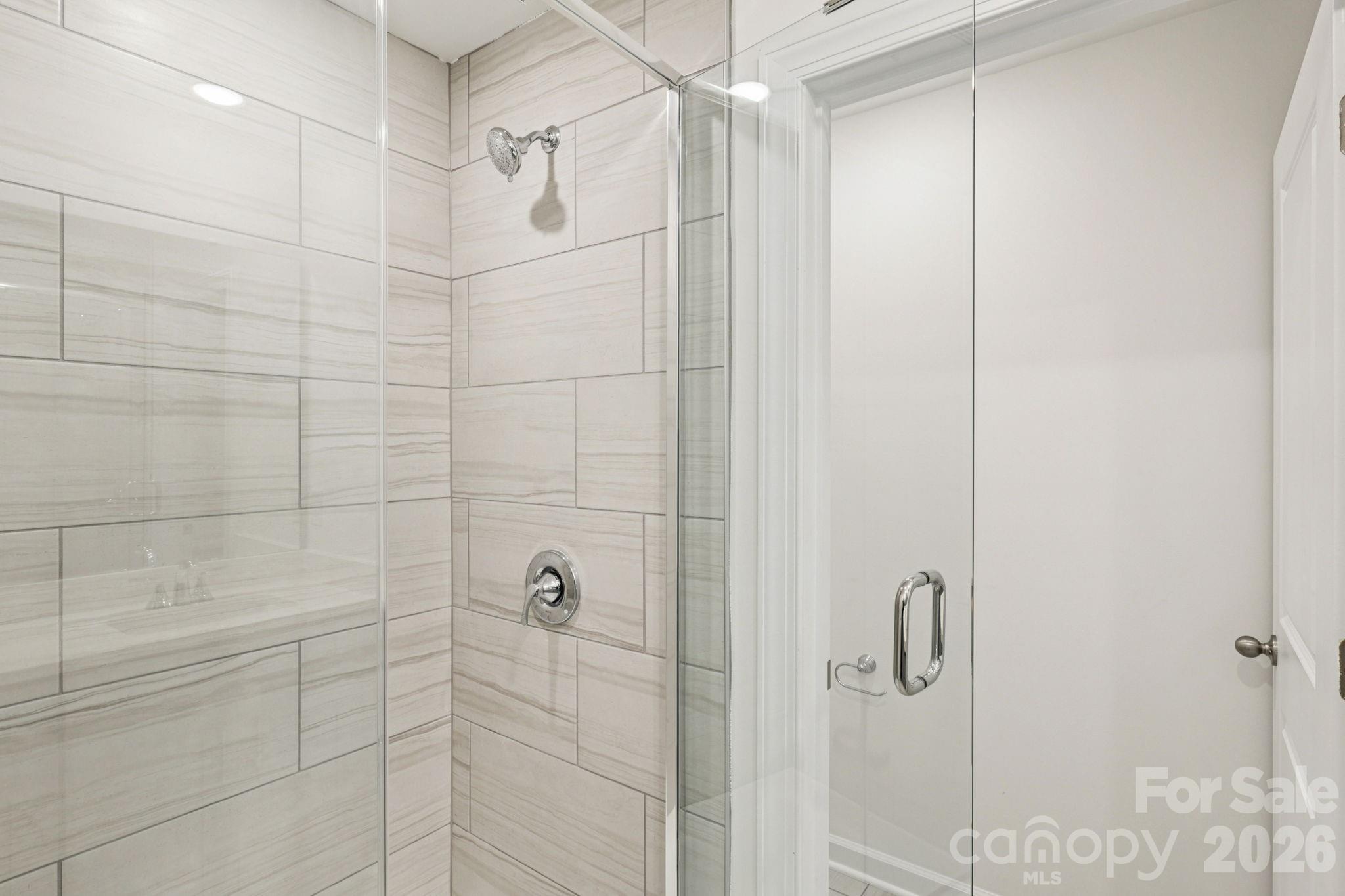 335 Golden Maple Court Fort Mill, SC 29708 - Photo 19 of 26 a bathroom with a shower