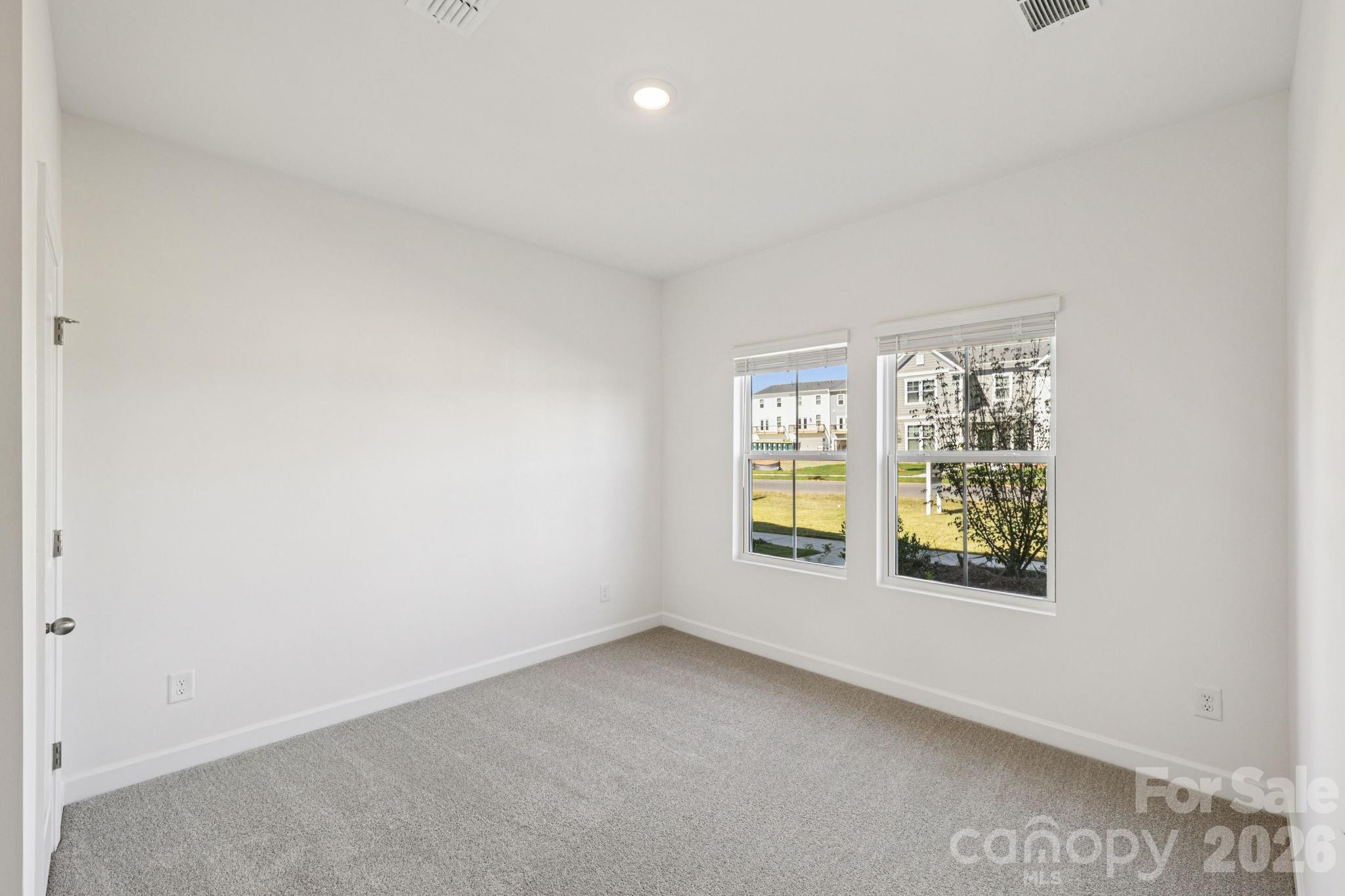 335 Golden Maple Court Fort Mill, SC 29708 - Photo 10 of 26 an empty room with a window