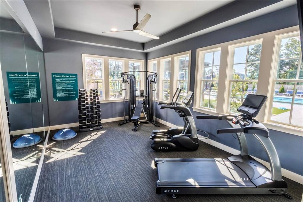 3373 Fence Road Northeast, Unit TH2 Dacula, GA 30019 - Photo 17 of 36 a view of a room with gym equipment