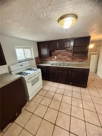 $59,900 | 1947 Spencer Avenue, Overland, MO 63114